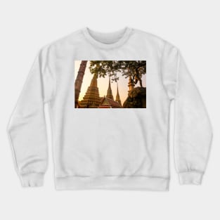 Mosaic tiled Buddha stupas and an iron sculpture at Wat Pho temple. Crewneck Sweatshirt